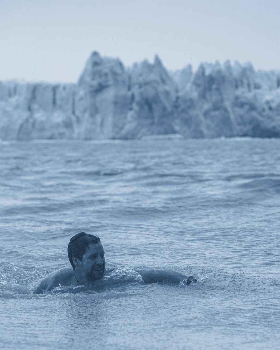 A swimmer in glacial water